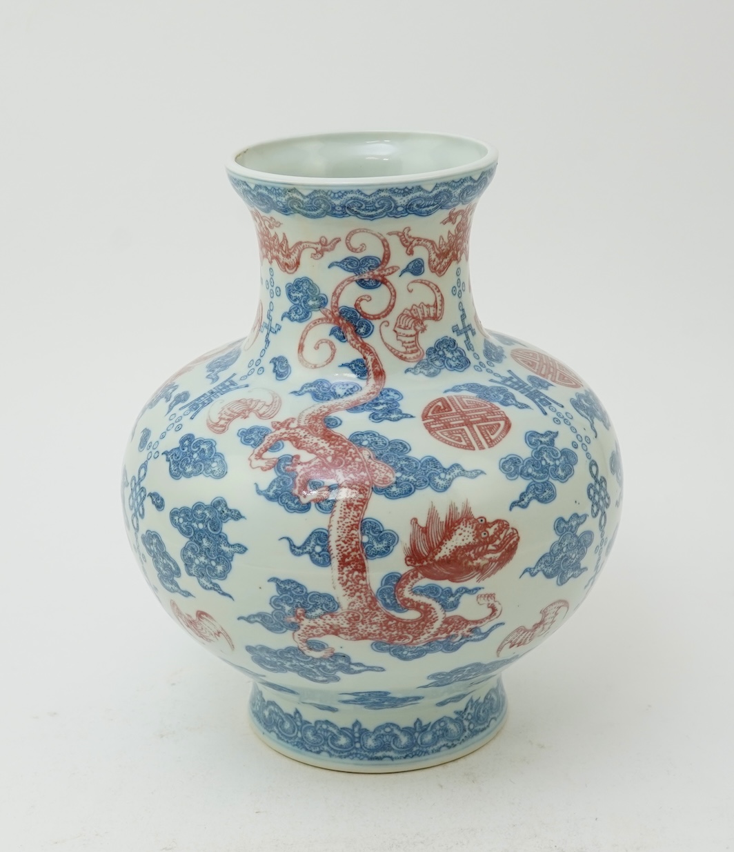A Chinese underglaze blue and copper red ‘dragon’ vase, Qianlong seal mark but early 20th century